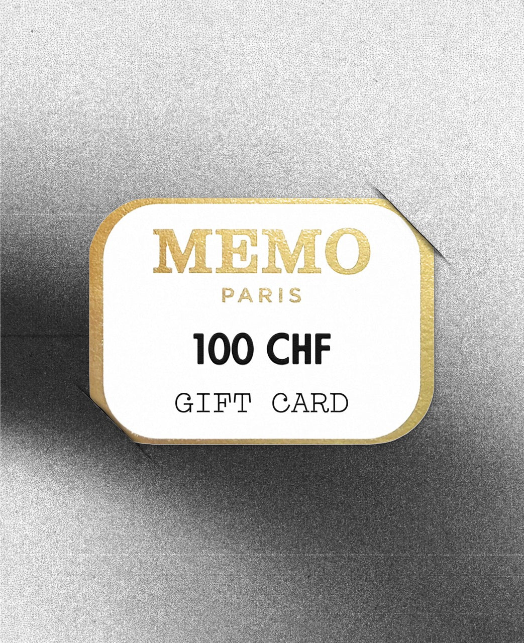 Gift card memo paris in white and gold with embossed lettering and 100 chf denomination for celebrating dream destinations — vue alternative