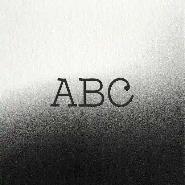 Grayscale gradient background with ’ABC’ text.