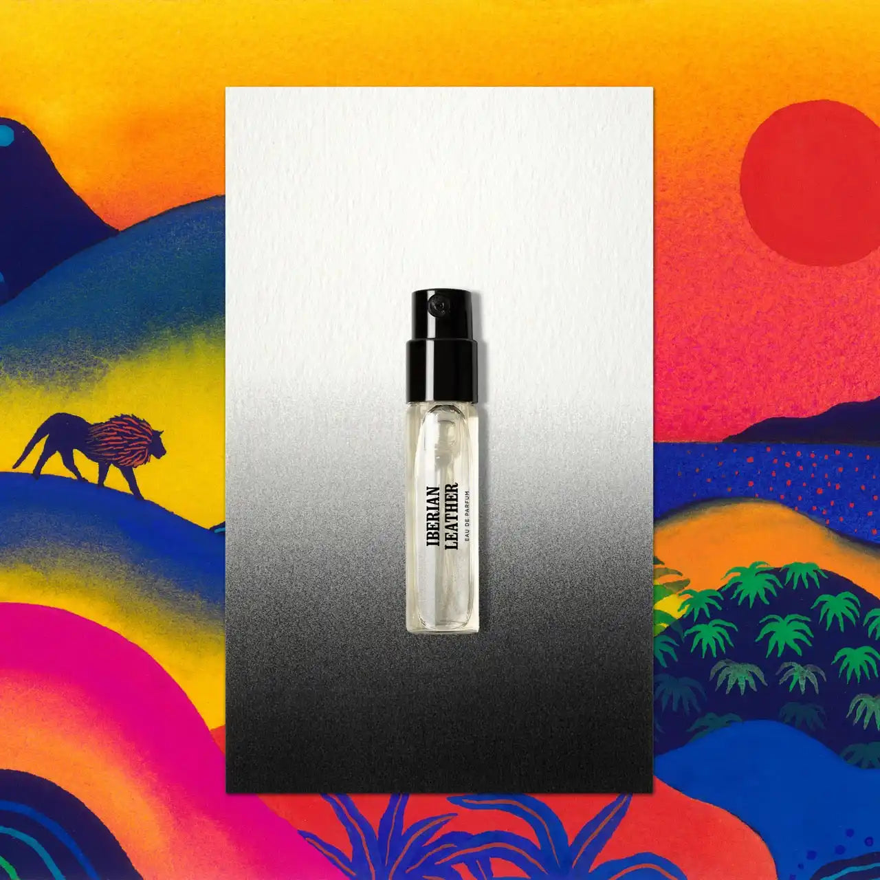 Clear perfume vial with black cap.