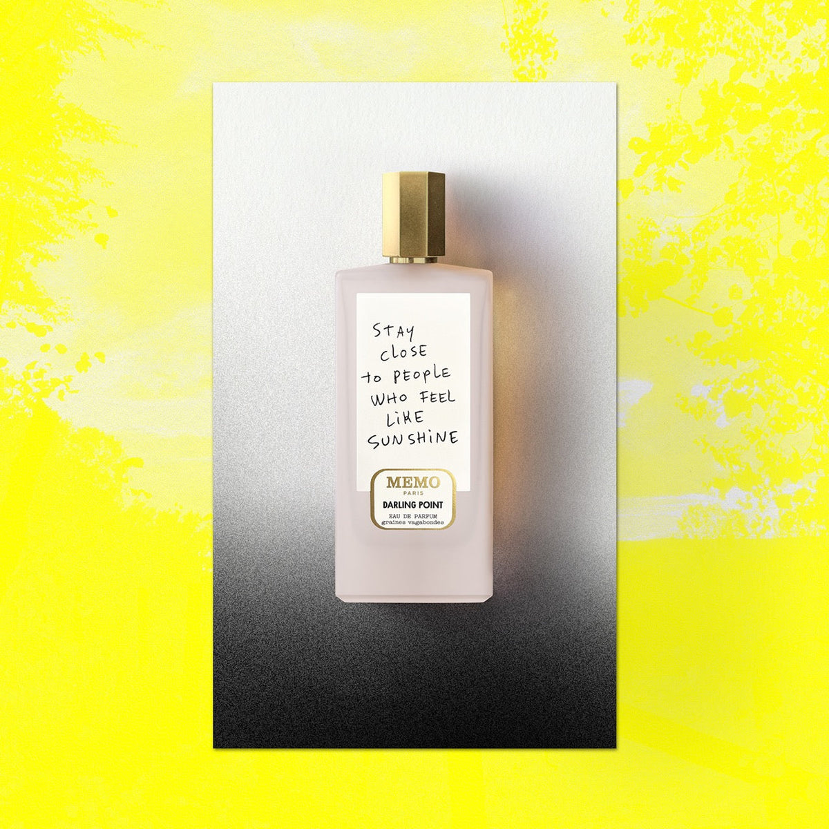 A pale pink rectangular perfume bottle with gold cap labeled stay close to people who feel like sunshine by memo paris darling point x thomas lelu — vue alternative