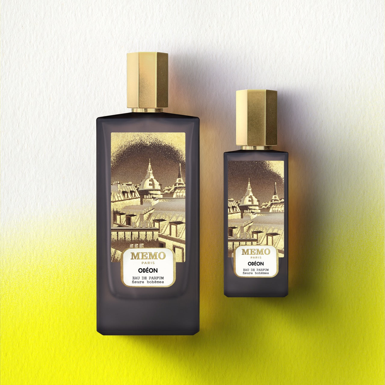 Two dark glass perfume bottles with gold caps from memo paris signature duet odéon featuring tonka bean scent — vue alternative
